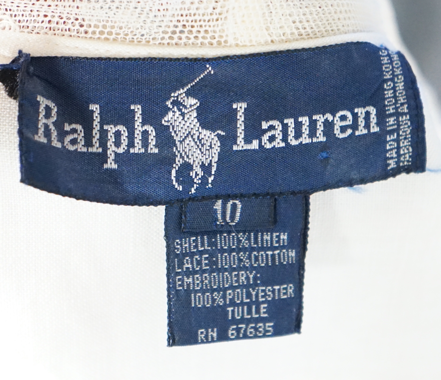 Two Ralph Lauren cotton blouses with lace detail, cream size 10, floral stripe size 8